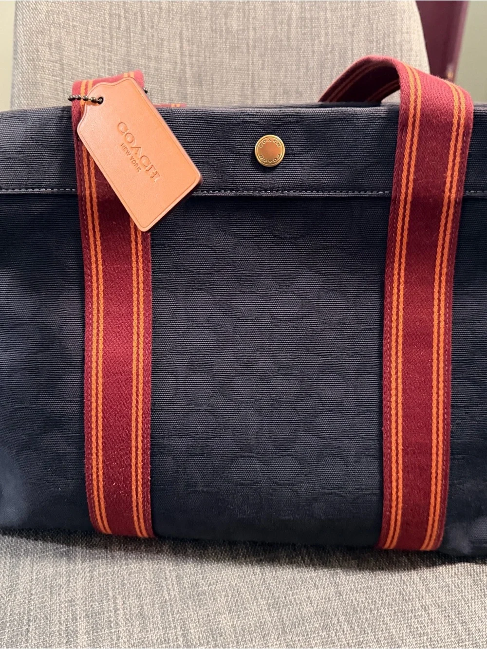 Coach Black Canvas Tote with Burgundy and Orange Straps with leather trim